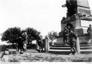 Chambers at left with a group of Duntroon graduates at a French monument. AWM image C05028.