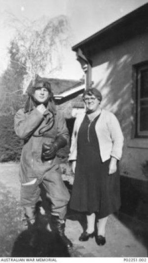 Harry Trowbridge with his mother at their home in Reid. AWM image P02251.002.